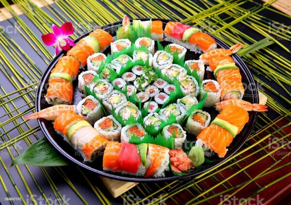 Rainbow Roll Tray: A colorful ensemble of fresh fish atop a California roll. (For 10 People)