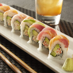 Rainbow Roll Tray: A colorful ensemble of fresh fish atop a California roll. (For 5 People)