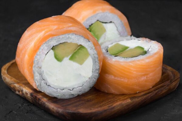 Philadelphia Roll Tray: Smoked salmon, cream cheese, cucumber, and avocado, all beautifully rolled. (For 5 People)