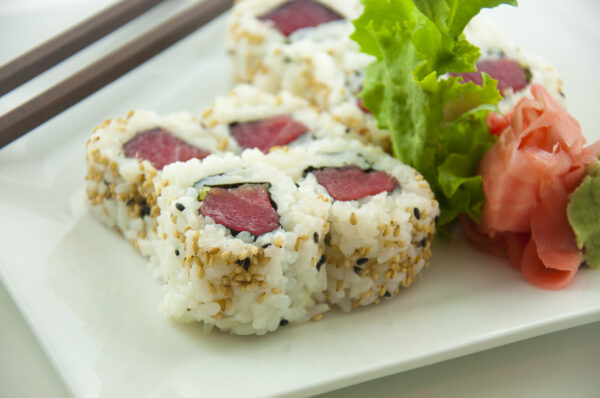 Spicy Tuna Roll Tray: A fusion of spicy tuna, cucumber, and creamy mayo, rolled in nori. (For 5 People)